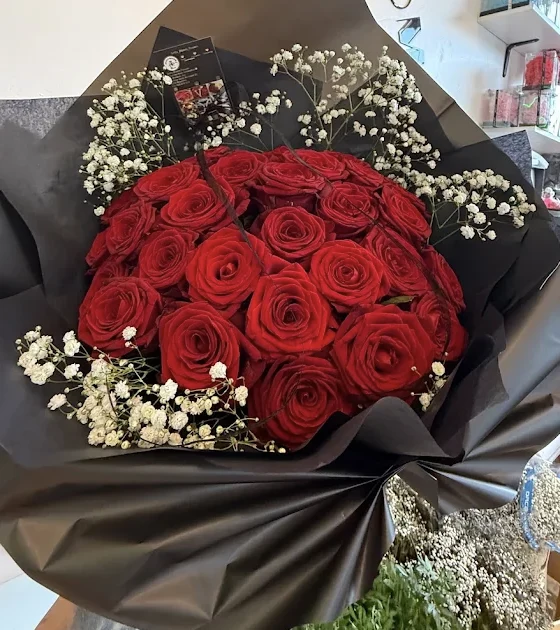 Bouquet de roses rouges créé par Betty Bloom